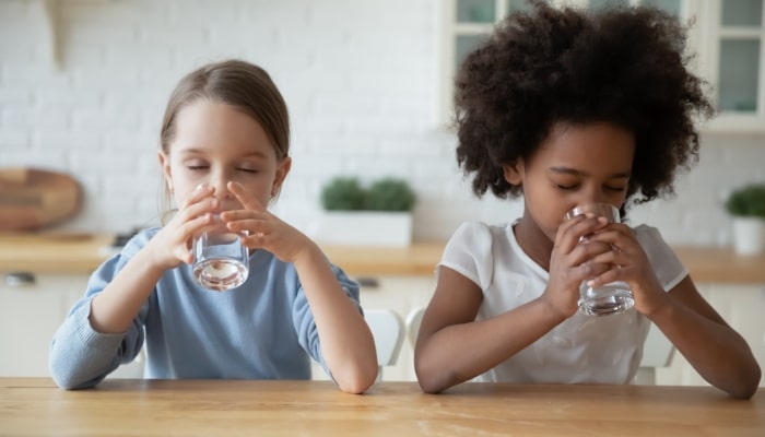 Two Children Drinking Water Two Children Drinking Water